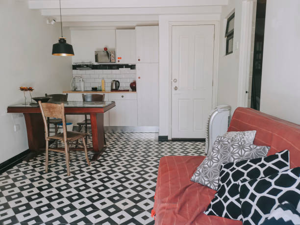 istock interior of housing apartment with kitchen, sofa and dining table 1300500389