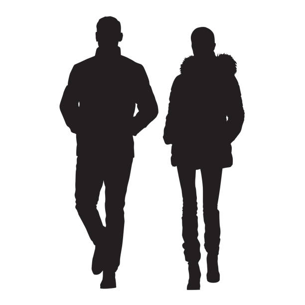 illustrations, cliparts, dessins animés et icônes de l’homme et la femme sont vêtus de vêtements d’hiver. gens qui marchent, jeune couple. silhouettes vectorielles - silhouette isolated pants adult