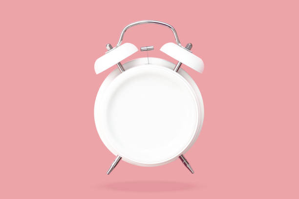 Creative layout of bell Alarm clock with blank plate hovering over pink pastel background. minimal idea business Concept of intermittent fasting, lunchtime, diet and weight loss.