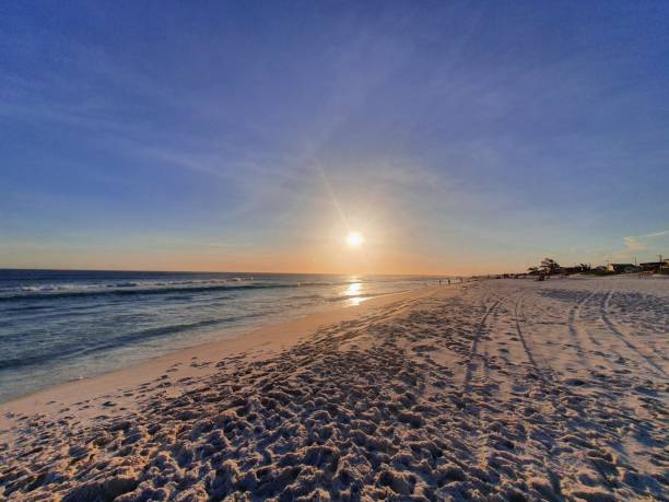 istock Relaxing sunset on the beach sand 1300508960
