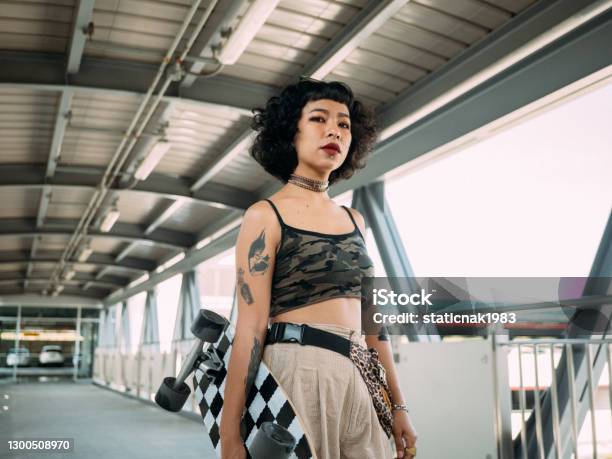 Hipster Asian Women Going To Play Skateboarding Stock Photo - Download Image Now - Women, Tattoo, Teenage Girls