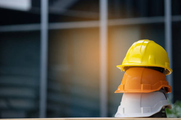 istock Group Safety Construction Worker Hats. Teamwork of the construction team must have quality. Whether it is engineering, construction workers. Have a helmet to wear at work. For safety at work. 1300509117