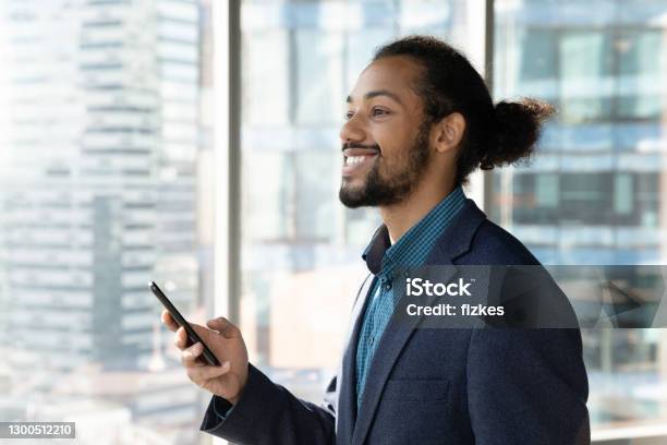 Headshot Portrait Of Smiling Ethnic Businessman In Office Stock Photo -  Download Image Now - iStock