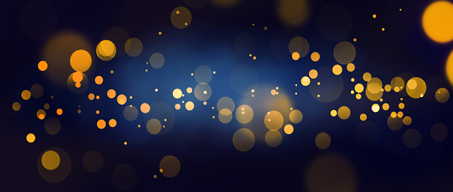 Gold bokeh on a blue background