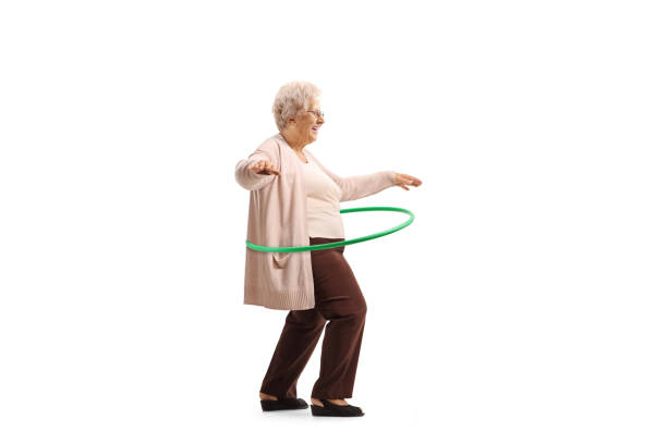 istock Grandma spinning hula hoop 1300514255