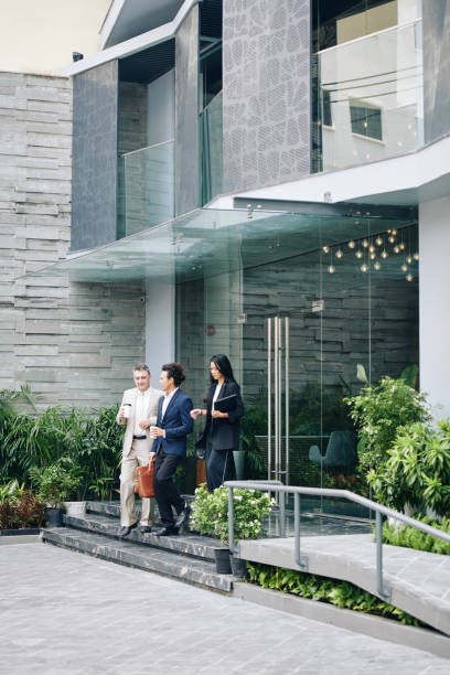istock Business people leaving office 1300514894
