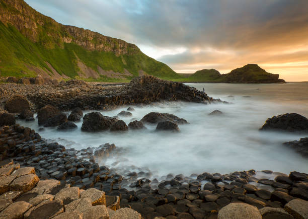 Giants Causeway in County Antrim - Northern Ireland Dusk at the Giants Causeway in County Antrim in Northern Ireland. A UNESCO World Heritage Site. giants causeway photos stock pictures, royalty-free photos & images