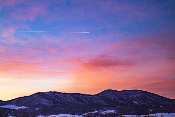 istock Sunrise over the winter landscape 1300520362
