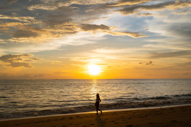 istock beautiful sunset at the beach in Thailand 1300522261