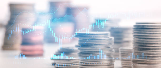 istock Double exposure Candle stick graph chart with indicator image of coin stacks on technology financial graph background. Finance and investment concept. Selective focus. 1300523296