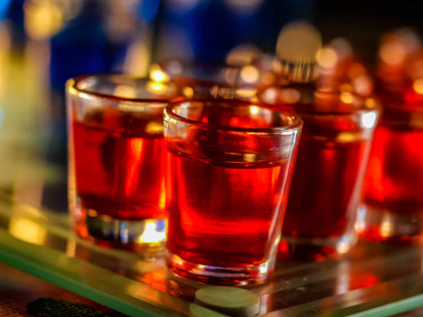 istock Chess board with shot glasses 1300526058