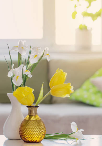 istock white home interior with spring flowers and decorations 1300526758