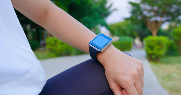istock woman hands touching smart watch 1300528399