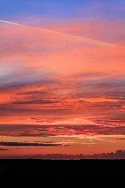 istock Colorful sunset with clouds in the evening 1300529490