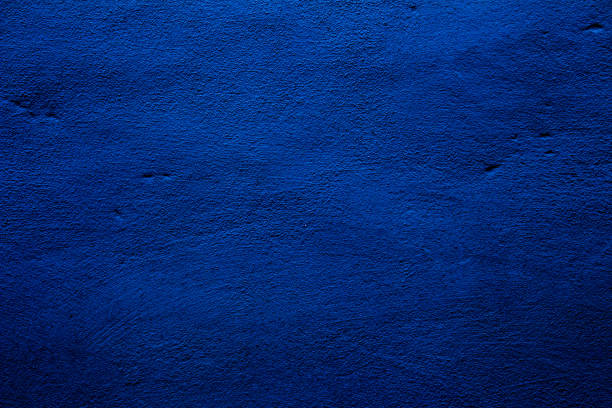 istock Blue colored abstract wall background with textures of different shades of blue 1300529500