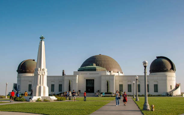 Exterior view of the Griffith Observatory in Los Angeles Los Angeles, California, USA - March 2009: Wide angle landscape view of the Griffith Observatory which is located on Mount Hollywood above the city griffith park observatory stock pictures, royalty-free photos & images