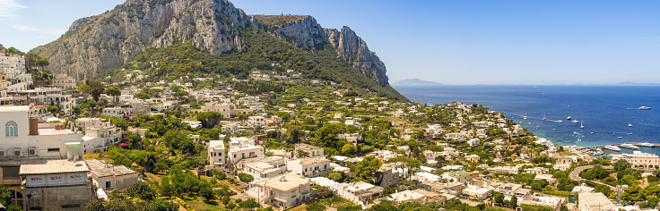 ISLE OF CAPRI, ITALY - AUGUST 2019: Panoramic view of homes on the Isle of Capri viewed from Capri town.