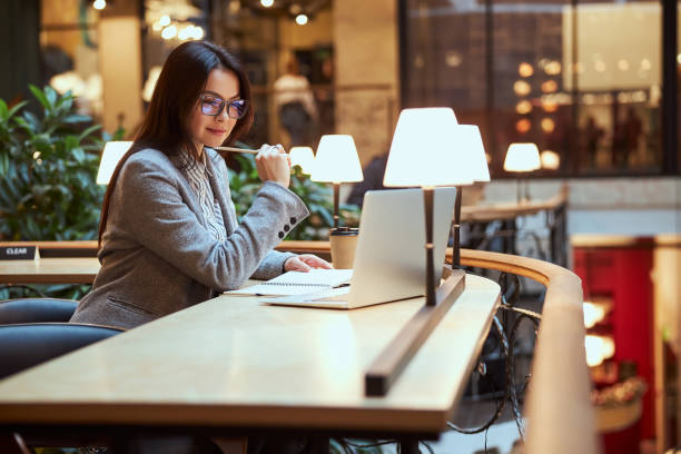 istock Attractive female person taking part in online conference 1300537006