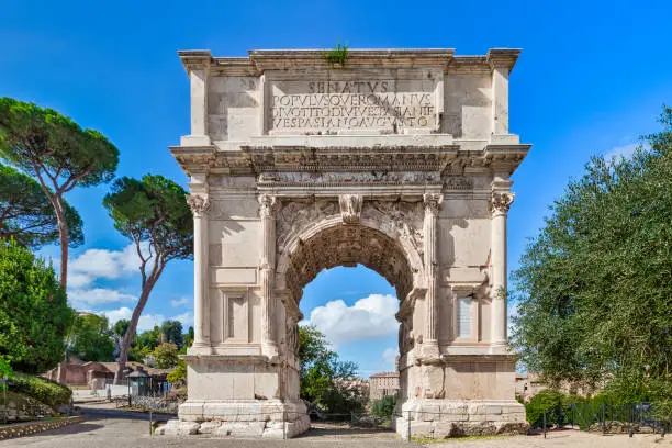 The iconic Arch of Titus on the Via Sacra in the Roman Forum in Rome, Italy