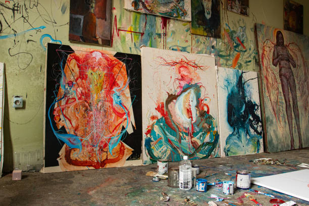 istock Abstract paintings, artist's palette and paints in different colors 1300538022