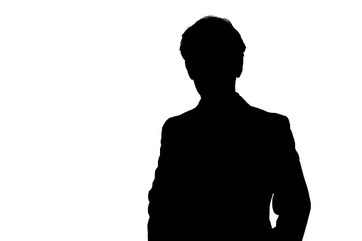 silhouette of a man on a white background. mysterious photo of a man.