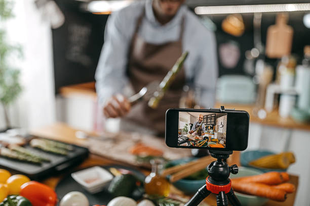 istock Young man vlogging about healthy food 1300539216