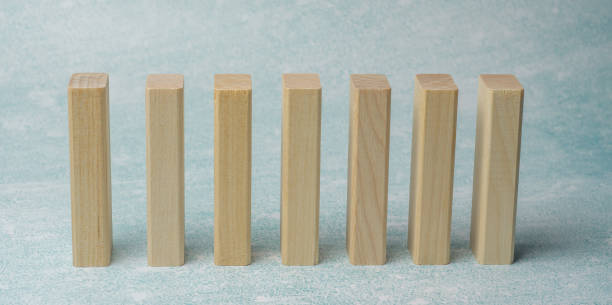 istock Hand arranging wood block stacking as step stair on wooden table. Business concept for growth success process. Copy space 1300540749