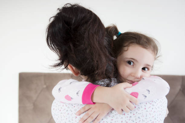 istock Mother and daughter at home 1300544283