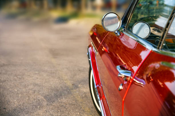 istock Selective focus shot of a red vintage car 1300546101