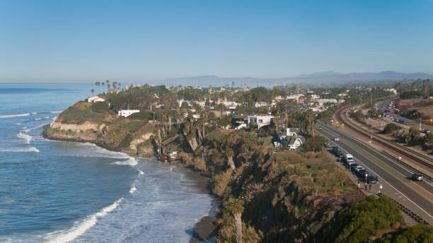 istock Beach and Clifftop Houses in Encinitas, CA - Aerial 1300550761