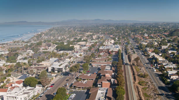 istock Drone Shot of Encinitas, CA with a Passenger Train Going Through 1300550805