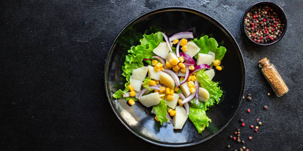 istock corn salad potato with vegetable lettuce on the table healthy meal snack top view copy space for text food background image rustic keto or paleo diet 1300553455