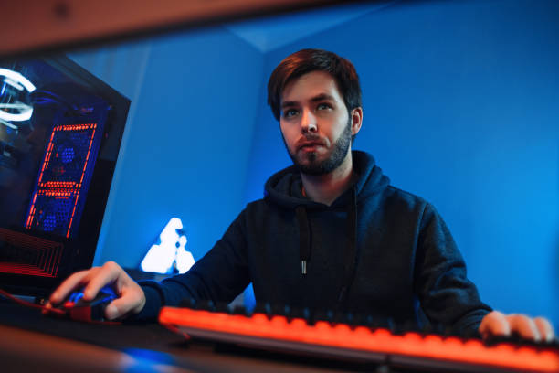 istock Serious pro gamer playing online video game 1300553747