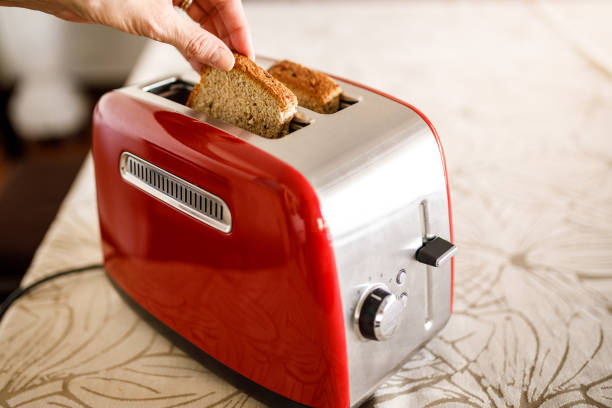 istock Toasts poping out of toaster 1300553885