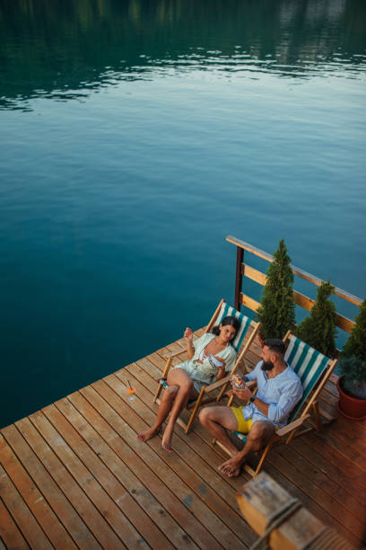 istock Lovely couple having lunch in beautiful natural environment 1300556000