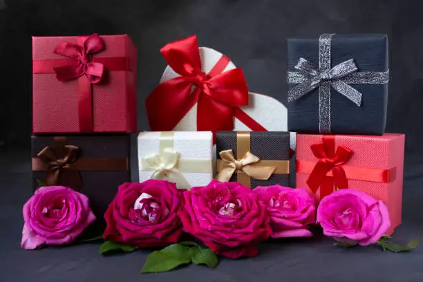 Happy Valentine Day. Valentines day background design. Valentine background. Red rose. Lots of gifts. Gift. Copyspace