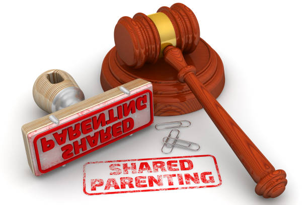 Shared parenting. The stamp and an imprint stock photo