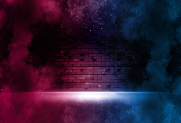 istock Rays neon light on neon brick wall. Empty scene. Neon reflections on wet asphalt. Cyberpunk background with copy space. 1300562781