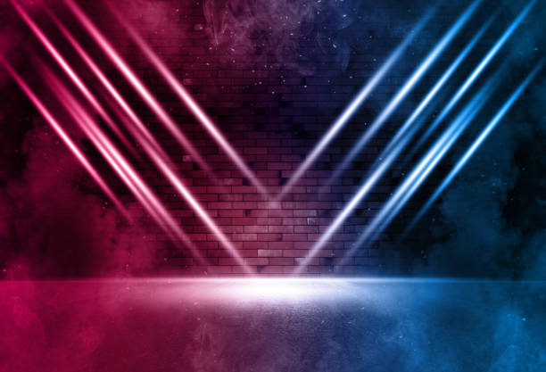 istock Rays neon light on neon brick wall with smoke. Neon reflections on wet asphalt. Empty scene with copy space. 1300562786
