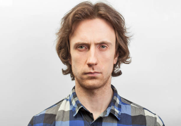 istock close up portrait of serious man 1300568298