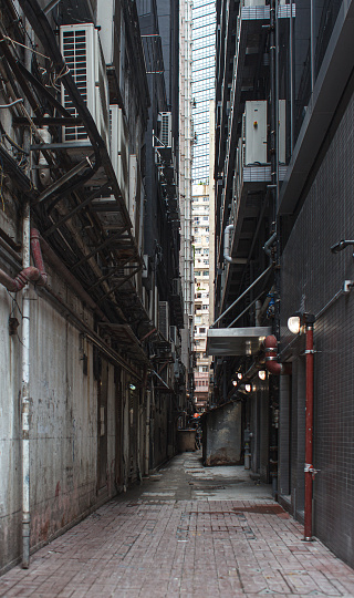 city alley backstreet between skyscrapers
