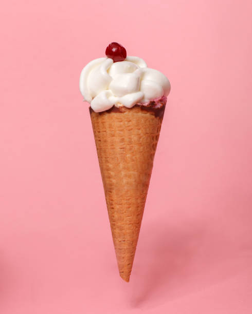 istock ice cream waffle cone with cranberry isolated on pink 1300578161