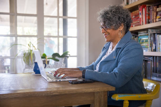istock Mature Black Woman Working from Home 1300579425
