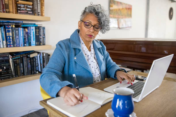 istock Mature Black Woman Working from Home 1300579450