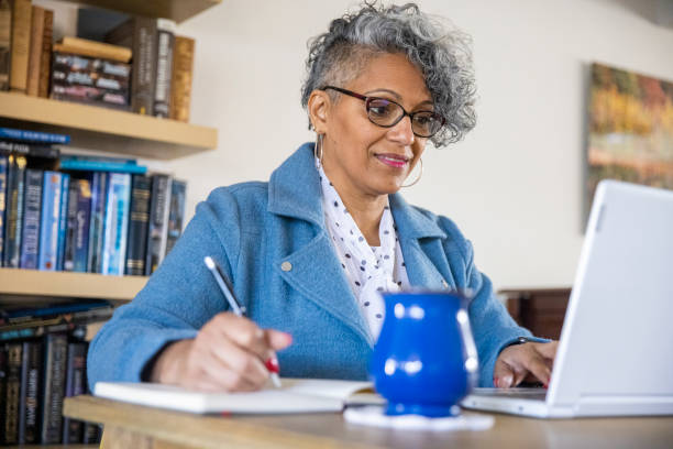 istock Mature Black Woman Working from Home 1300579465