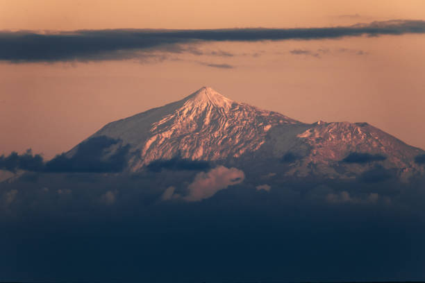 istock Snowcapped Mountain during sunset a winter day 1300579484