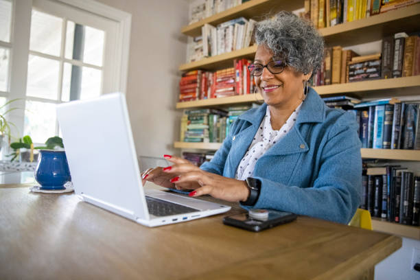 istock Mature Black Woman Working from Home 1300579529