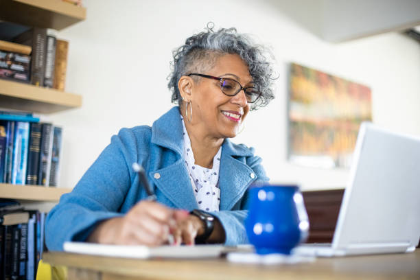 istock Mature Black Woman Working from Home 1300579538