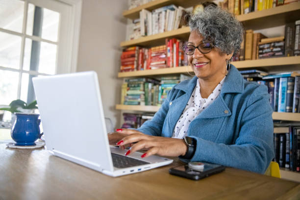 istock Mature Black Woman Working from Home 1300579549