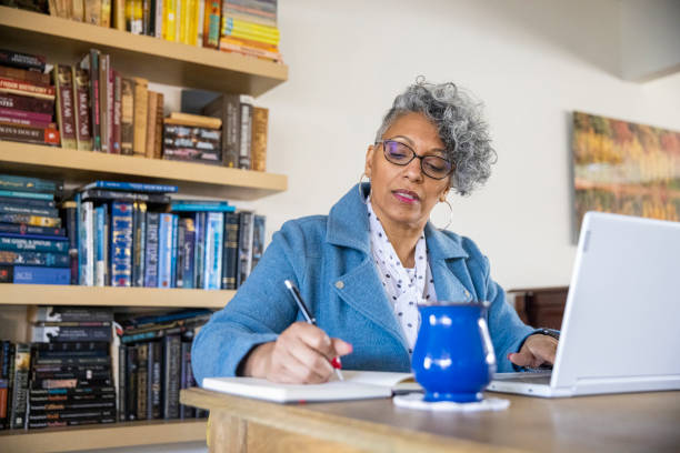 istock Mature Black Woman Working from Home 1300580116